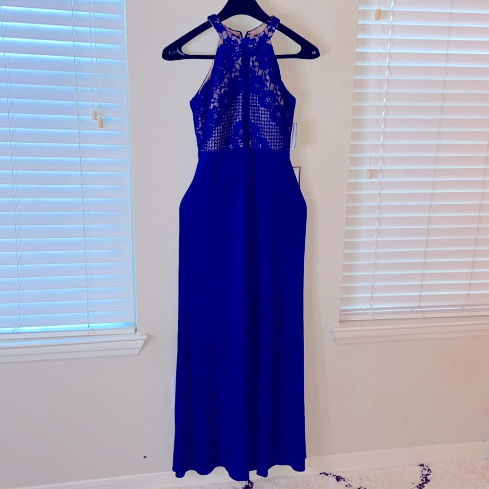 Sleeveless royal blue maxi dress.